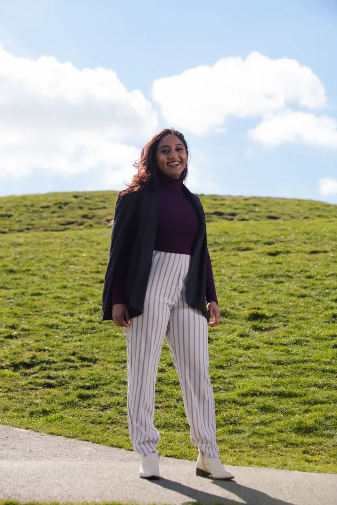 Nivi, founder of Soapbox Project standing outside